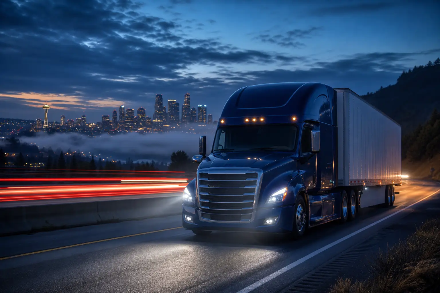 Thind Transport truck running a night lane outside Seattle